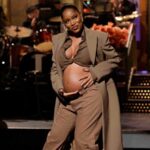 Keke Palmer reveals baby bump as part of her 'Saturday Night Live' opening monologue
